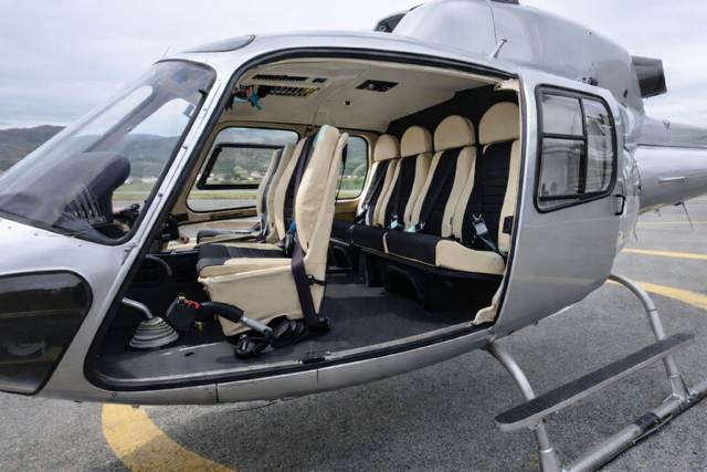 Passenger cabin of Airbus AS355 helicopter used for private charter flights from Athens to Amorgos